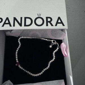 Pandora tennis bracelet with red heart stone